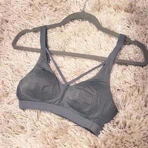 Olive green sports bra with strappy detailing